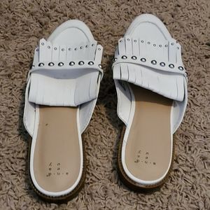 White slip on shoes